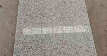 林芝芝麻白光面毛板